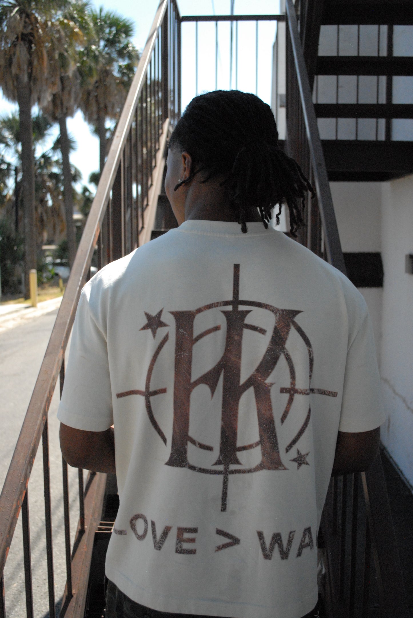 “love > war” tee